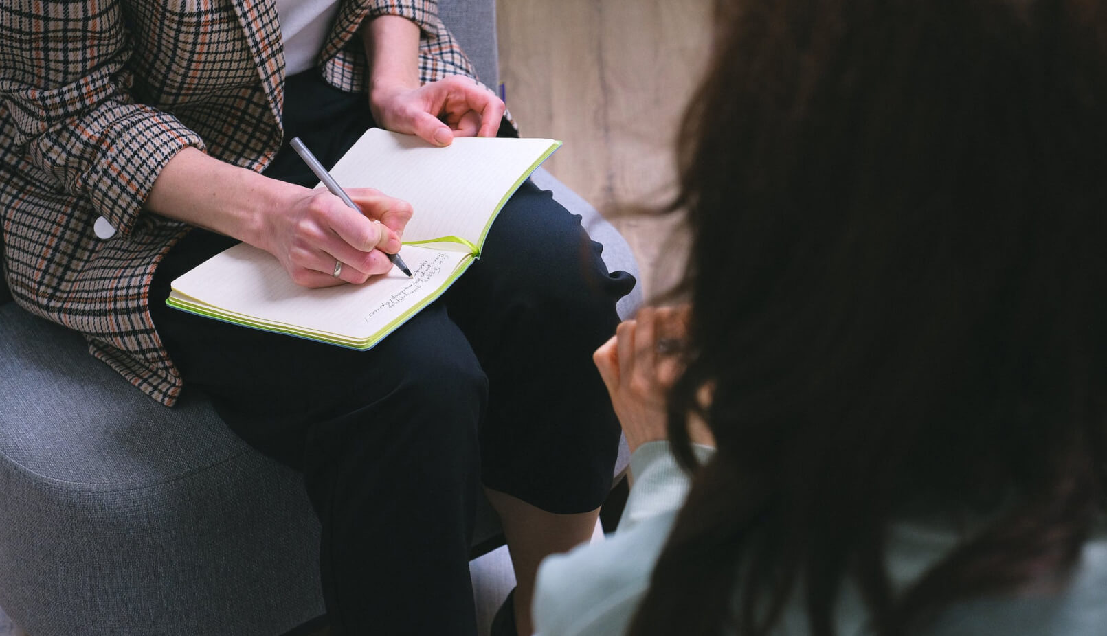 Woman consults with relapse prevention plan specialist