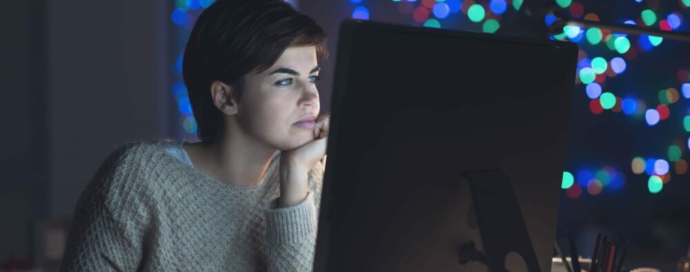 Woman is looking at the monitor