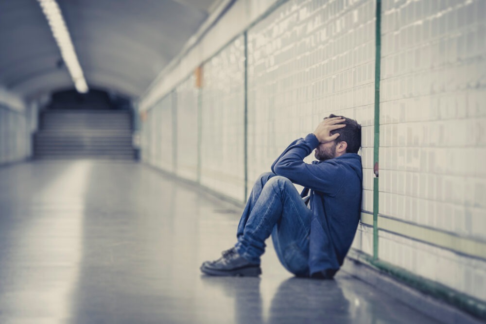 A frustrated man in a subway