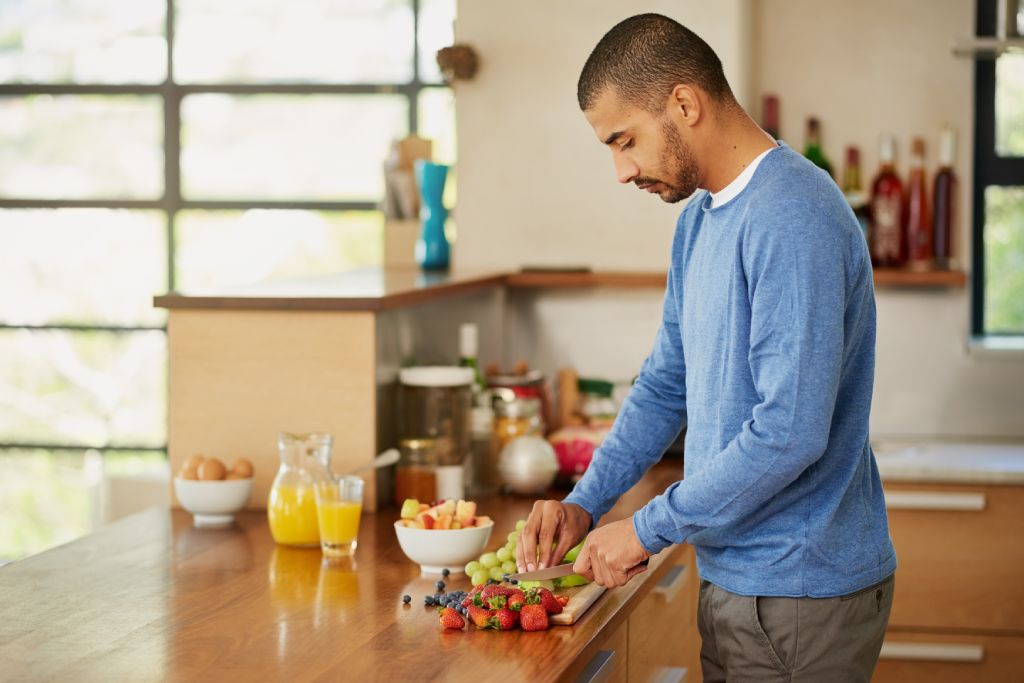 A man cooking a healthy meal